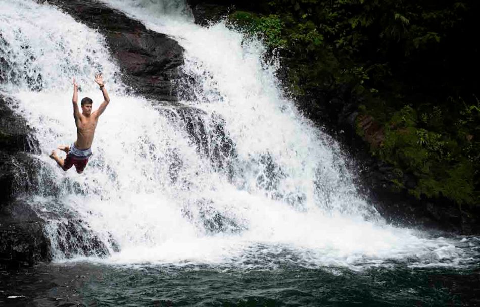 Marc jumps off a waterfall during our three-day rafting trip on the Pacuare River.