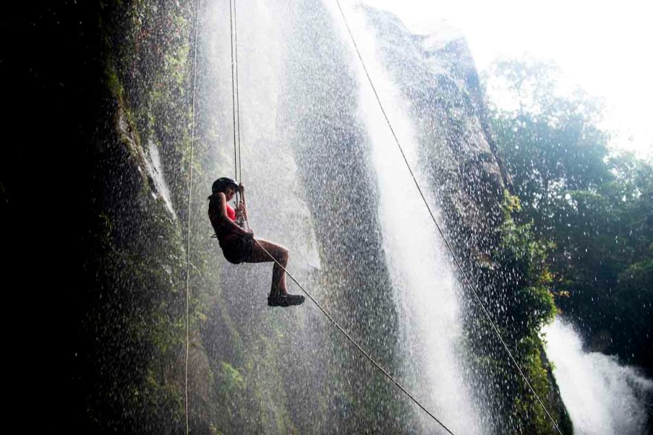 Sylvia rappels down a waterfall near Uvita, Costa Rica. 