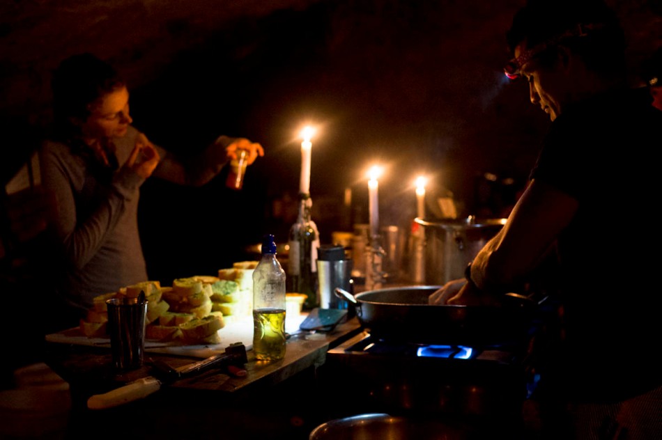 Our wonderful guides prepare a delicious vegetarian dinner by candlelight under Diamante Falls. 